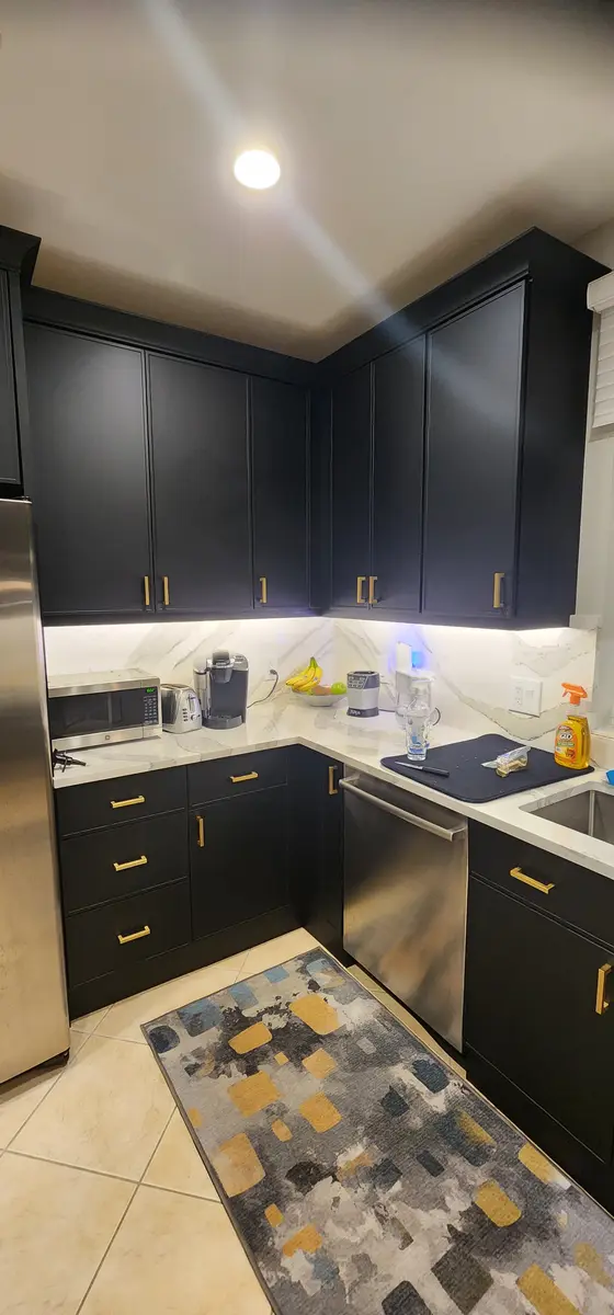 Installed kitchen with cabinet runs and appliance surrounds
