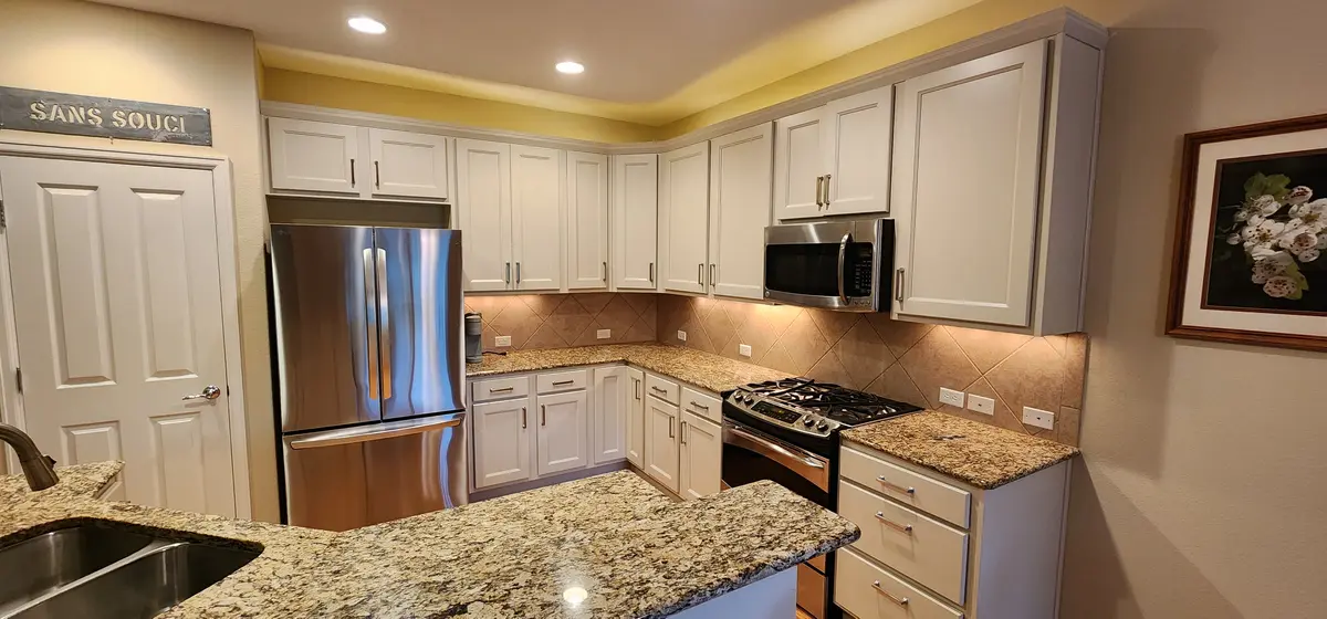 Installed kitchen with cabinet runs and appliance surrounds