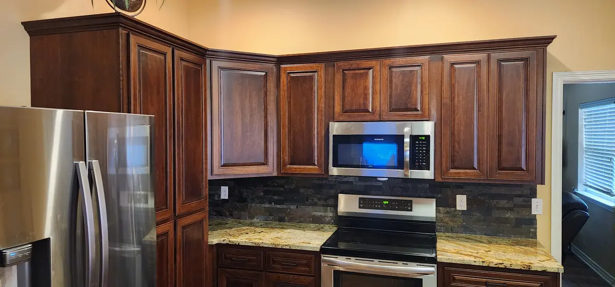 Installed kitchen cabinet run with hardware fitted