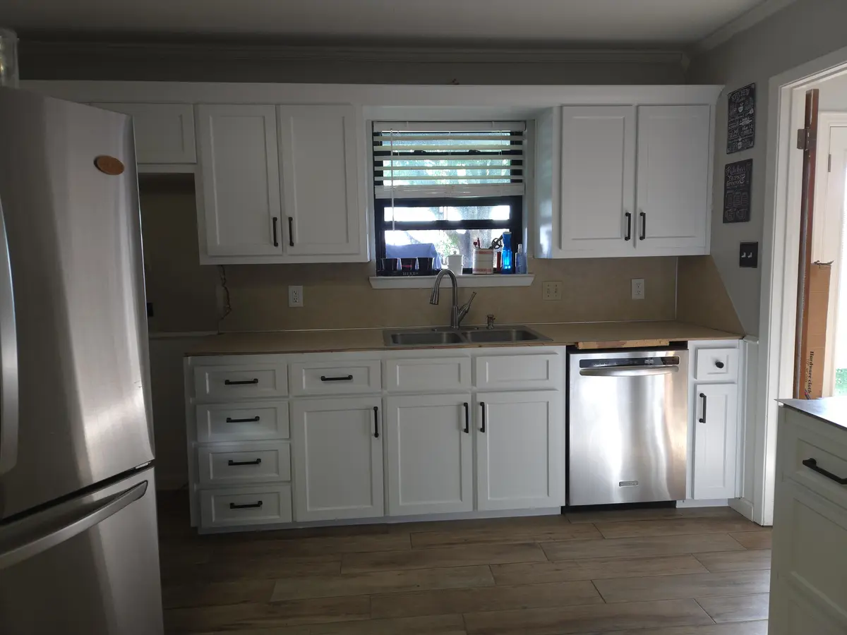 Installed kitchen cabinet run with hardware fitted