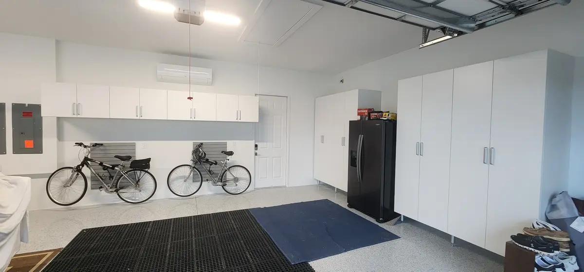 Installed storage system with cabinet runs and shelving