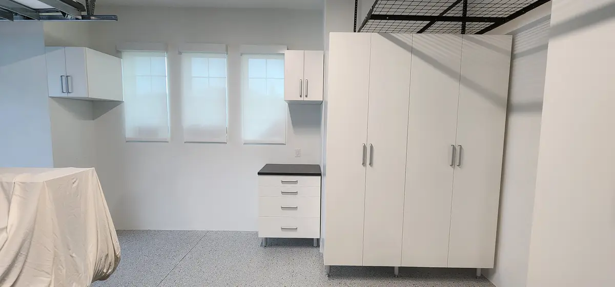 Installed storage system with cabinet runs and shelving