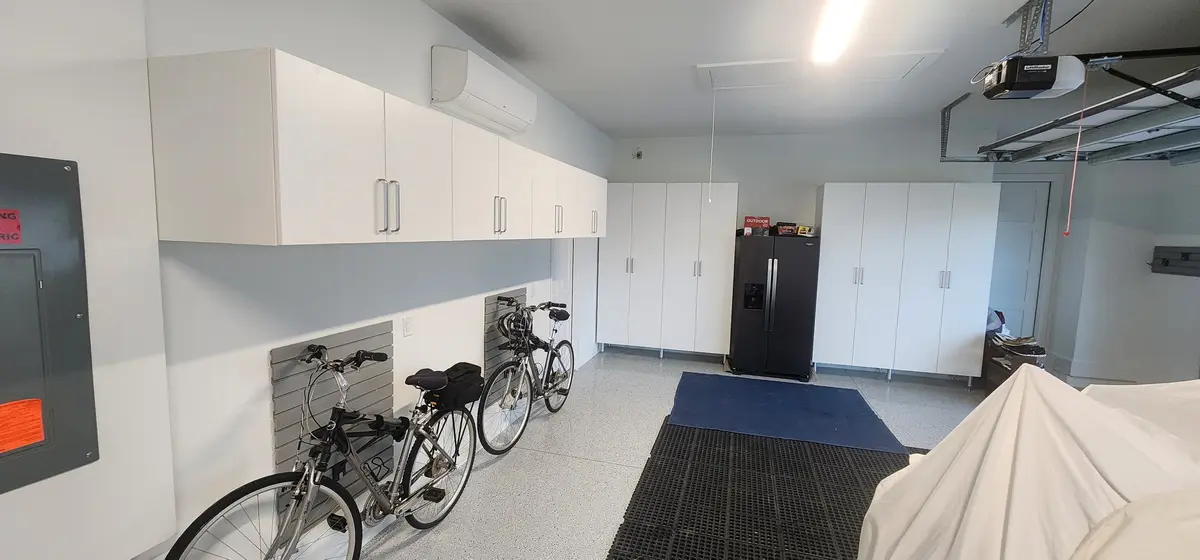 Installed storage cabinetry with overhead units and base cabinets